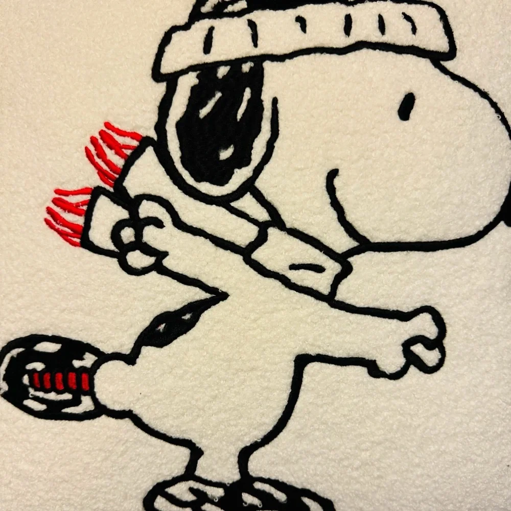 Holiday pillow skating Snoopy
